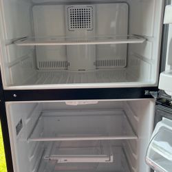 A Black Refrigerator Six Months Old I Paid $900 For it I Only Want $400.