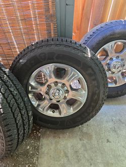 Ram 2(contact info removed) 18" stock rims with 33" tires