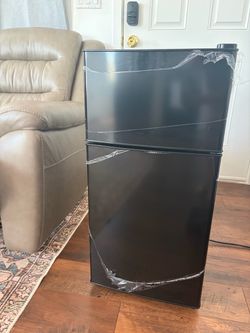 Brand new mini fridge.
