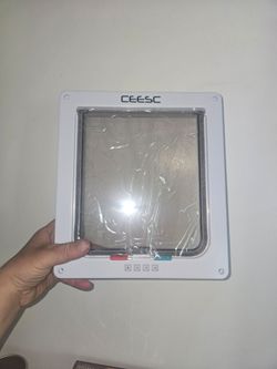 Cat-dog door never used or installed like new