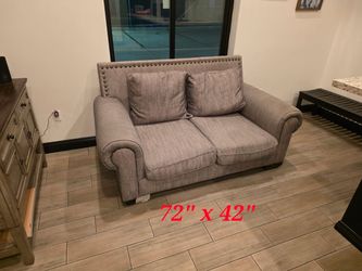 Gray Fabric Loveseat with Nailhead Trim