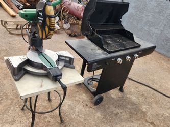 Grill and wood cutter