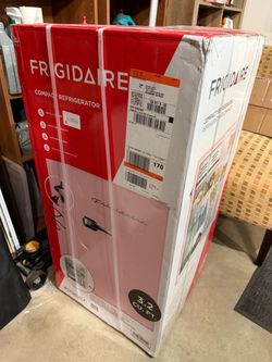 Pink mini fridge