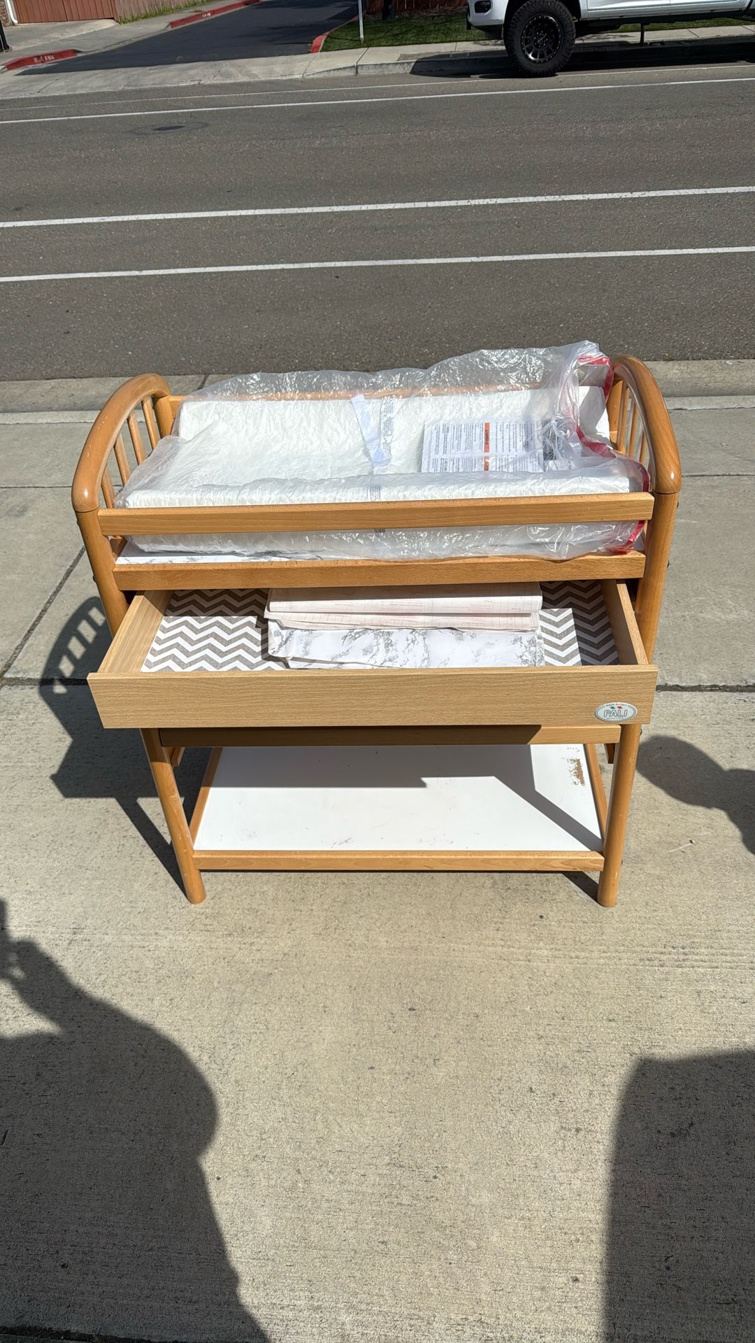 Changing table with brand new padded mattress