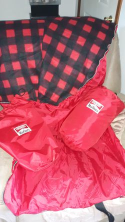 2 red and black Marlboro sleeping bags.