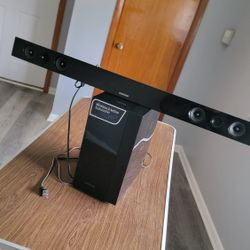 Samsung HW-F450 2.1 Channel Soundbar System with a wireless subwoofer. 