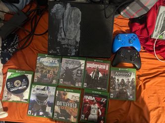 Xbox one with 8 games and 2 controllers