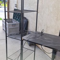 Nice 5 tier storage rack with electric outlet and USB ports 