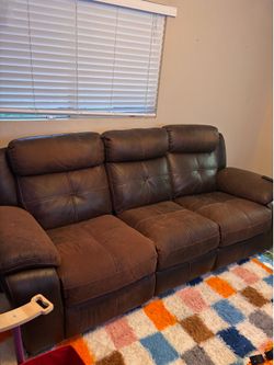 Brown leather like couch & Reclining separate chair (ends recline)