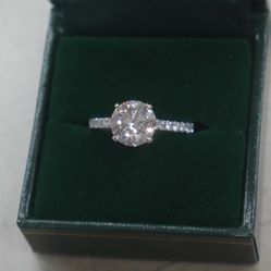 14KT WHITE GOLD ENGAGEMENT RING 3.9 GRAMS ; SIZE 6.5 ; WITH LAB CREATED ROUND DIAMOND E VS1 2.42 CARATS ;  30 SIDE DIAMONDS ( NATURAL ) APPROXIMATELY 