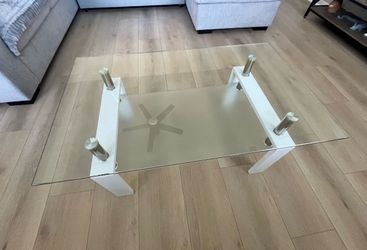 Glass top coffee table