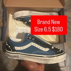 Size 6.5 “Black Navy Pearlized” Vans