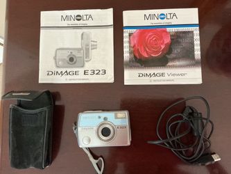 Minolta and Canon digital cameras.  Everything included