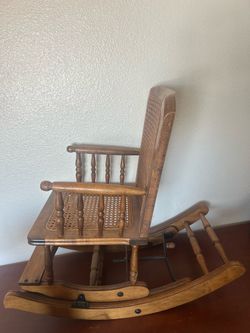 Antique toddler rocking chair has crack needs Tlc