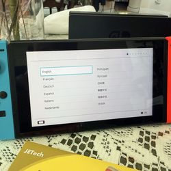 Nintendo Switch (1st Gen) Bundle w/ Dock, Joy-Cons + Unopened Yoshi Game