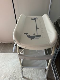 Baby changing station and bath tub