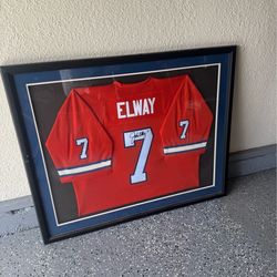 Framed and signed John Elway Jersey