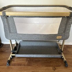 A MKE baby Bassinet. 