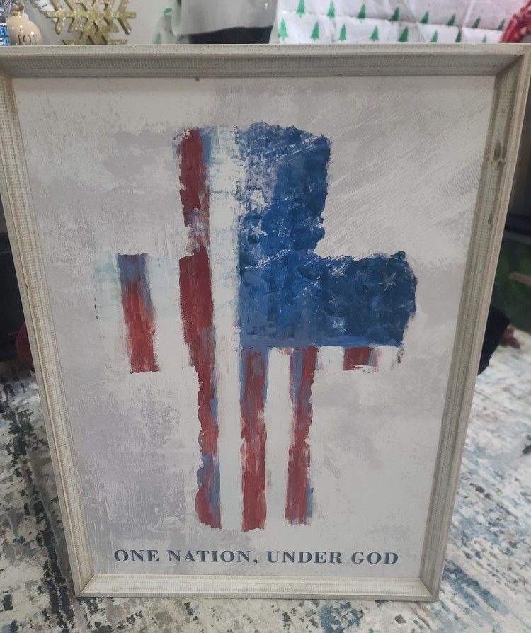 Abstract painting of an American flag with the phrase "ONE NATION, UNDER GOD" printed below. 