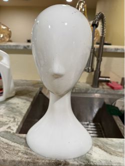 WIG STAND, 16" tall ; cross streets are Arapaho & Waterview