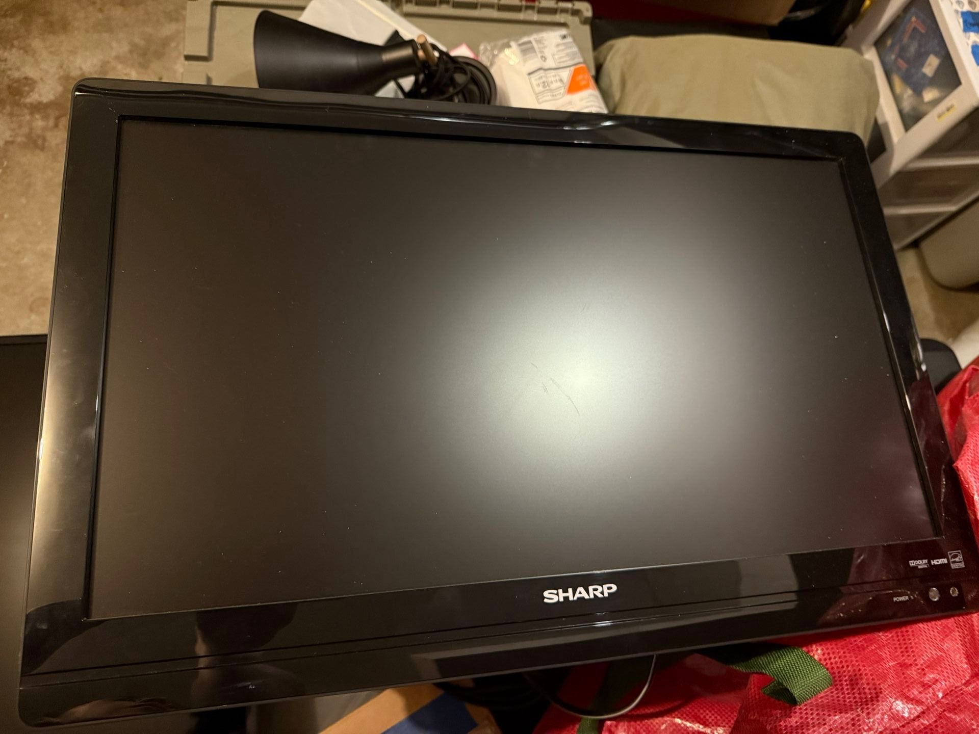 24in Sharp Mounted TV