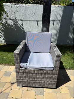 8 patio chairs with cushions.