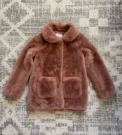 Girl’s collared faux fur coat from H&M in a dusty pink shade, size 10