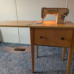 Antique Fold-away Sewing Machine 