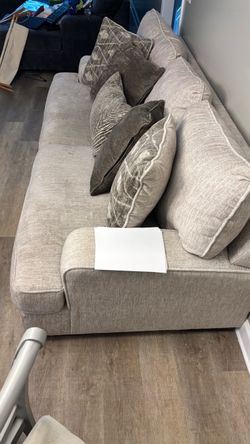 Large Beige Fabric Sofa with Throw Pillows