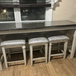 Table And Bar Stools 