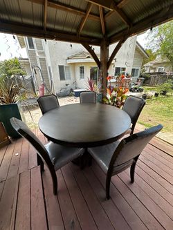 Round Pedestal Dining Table with 5 Upholstered Chairs