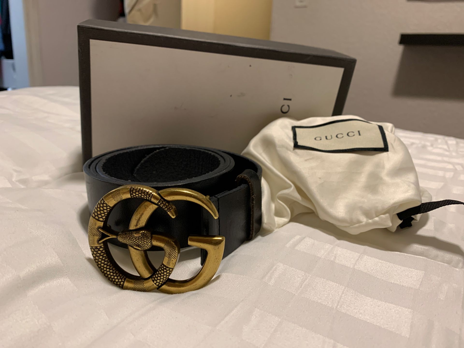 Gucci men’s snake GG leather belt . Black Gucci belt