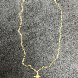 14k gold fígaro chain with 14k gold cross crucifix pendant