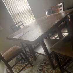 Hard wooden high top table and 4 Chairs
