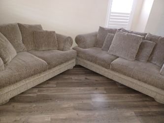 Sofa and love seat. all pillows Reversible