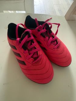Girls pink Adidas soccer cleats