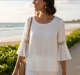 Zac & Rachel Women’s Size Medium White Blouse Crochet Lace Bell Sleeve Tunic Top.
The item in the image is a Zac & Rachel White Crochet Lace Bell Slee
