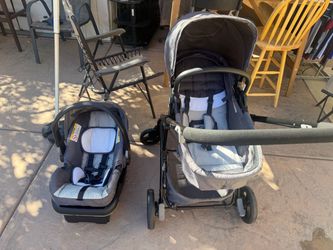 Baby Trend Passport Switch Modular Travel System (or a very similar Baby Trend Passport series modular stroller and infant car seat combo) in grey.