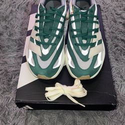 Size 11, men’s brand new unworn Adidas shoes with tags and box.