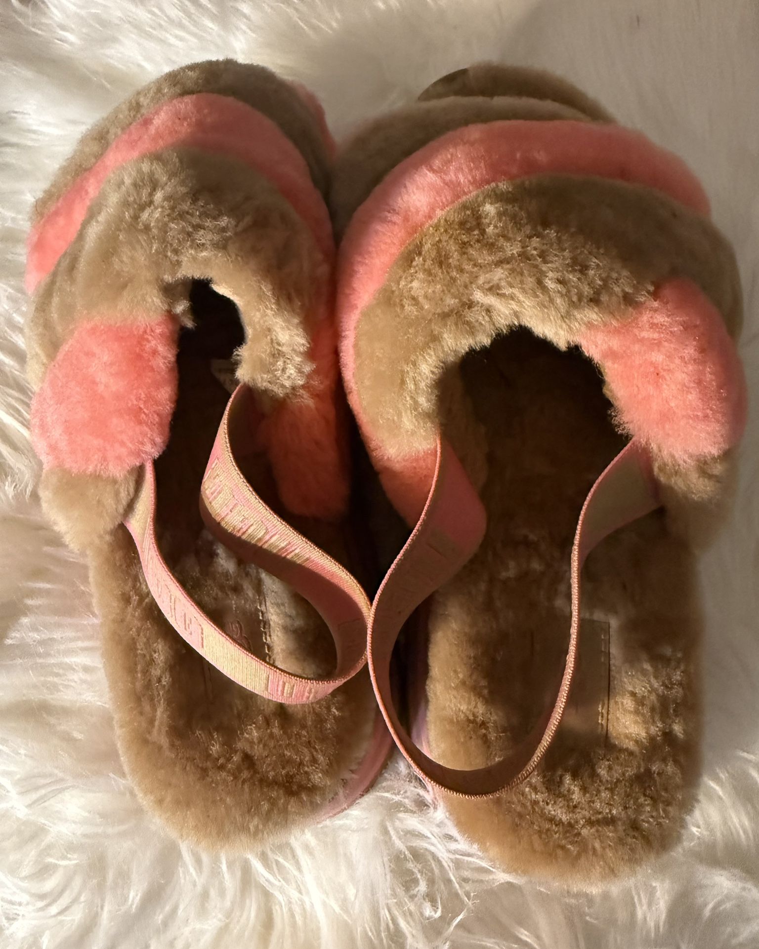 This is an UGG Women's Disco Stripe Slide slipper in the Chestnut/Pink Rose. Size 7