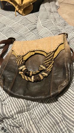 ‘The Sak’ Brown Leather Crossbody Bag with Braided Detail