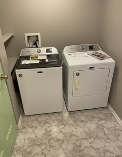 One year, old washer, and electric dryer