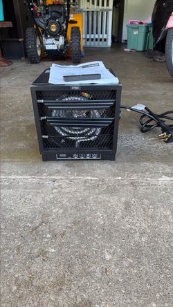 New-in-box garage heaters with remote control