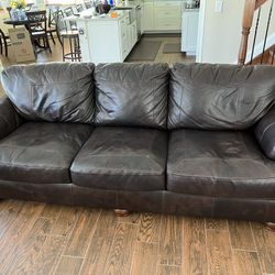 Leather Couch, Loveseat, Chair And Ottoman.