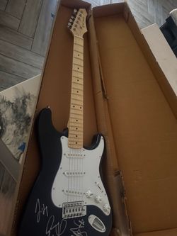 Autographed electric guitar
