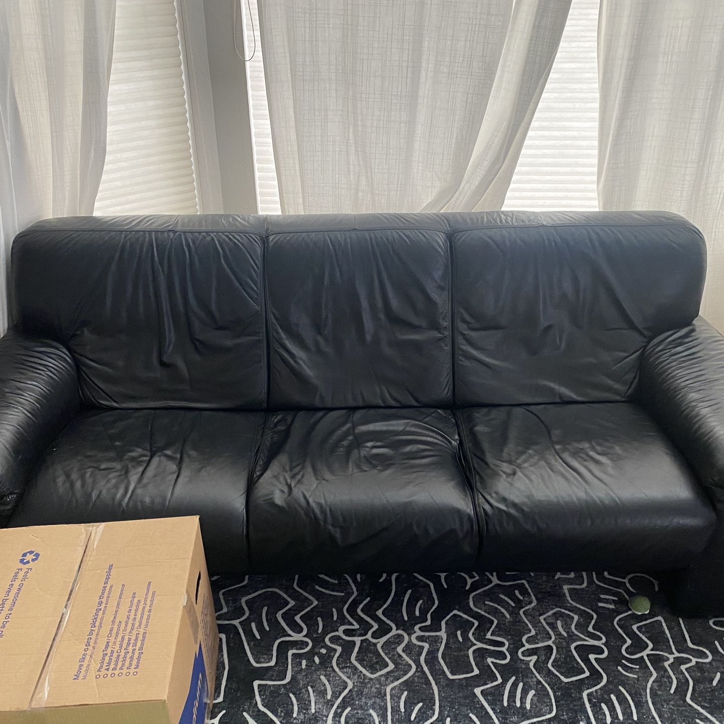 Vintage black leather sofa couch