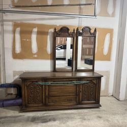 brown dresser with w mirrors