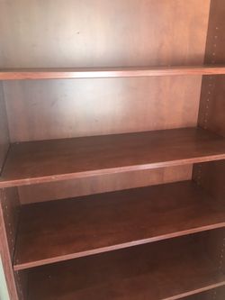 Two matching cherry wood-stained 5 bookshelf units for only