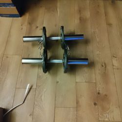 Dumbell Handles And 4 -5 Pound Plates