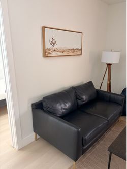 IKEA black two seater couch